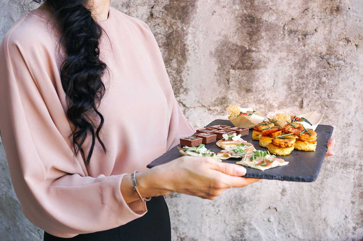 woman holding tray