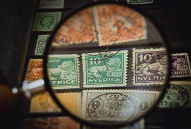magnifier with stamps