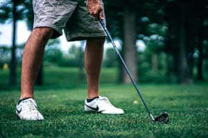 golfer holding club